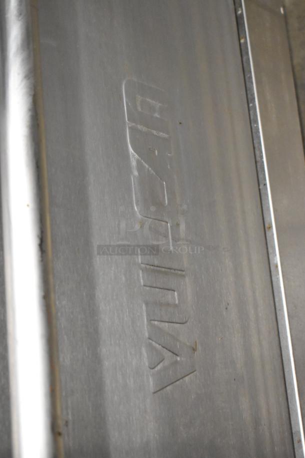 Vulcan SX36 stainless steel range with 6 burners, oven, over shelf, back splash, 198,000 BTU, "Vulcan" engraved.