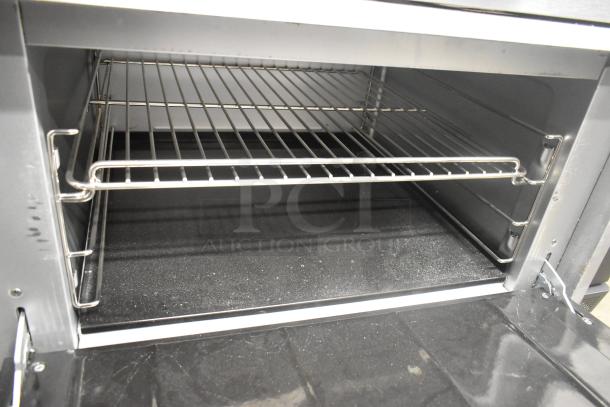 Vulcan SX36 stainless steel commercial oven interior, featuring a durable rack system.