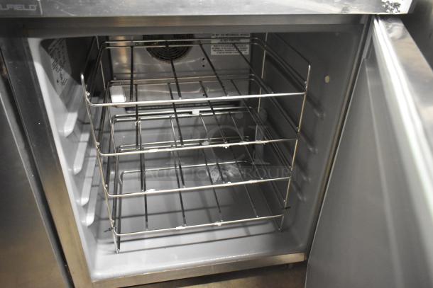 2019 Delfield 406P-STAR2 stainless steel undercounter cooler, single door on casters, interior racks shown, 115V, 1 phase.