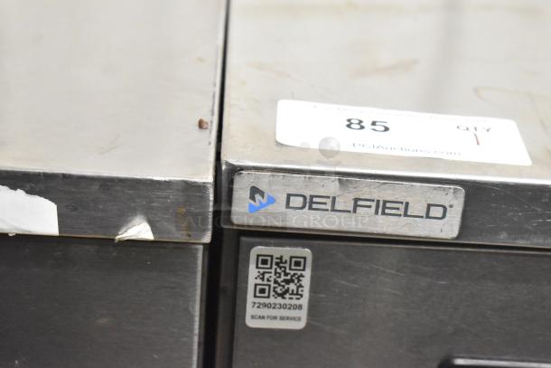 2019 Delfield 406P-STAR2 stainless steel undercounter cooler, single door, on commercial casters, with QR code label.