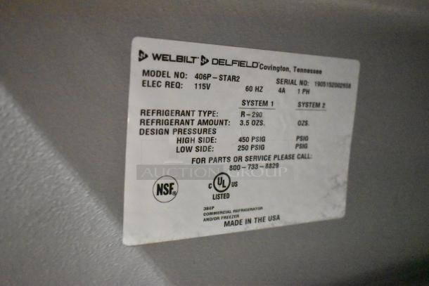 2019 Delfield 406P-STAR2 stainless steel undercounter cooler, featuring commercial casters, 115V, and Phase 1. Label shows refrigerant type R-290, NSF listed.