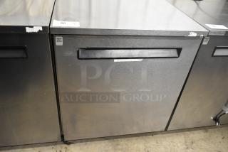 Delfield 406P-STAR2 stainless steel undercounter cooler with single door, commercial casters, 115V, 1 phase, minor wear.