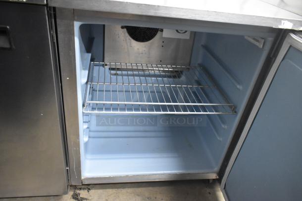 Delfield 406P-STAR2 stainless steel undercounter cooler, single door, 115 volts, commercial casters, in good condition.