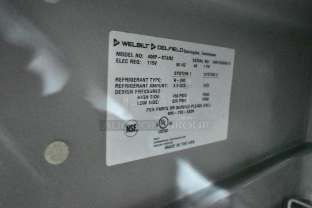 2019 Delfield 406P-STAR2 undercounter cooler, stainless steel, single door, on commercial casters; label shows 115V, R-290 refrigerant.