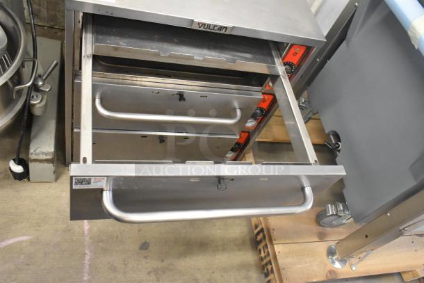 Vulcan stainless steel 3-drawer warming drawer, commercial-grade, visible Vulcan logo, good condition, sturdy handles.