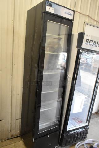 KoolMore KM-MDF-17S slim merchandiser freezer, 6.5 Cu. Ft., black, glass door, manual defrost, 115V, model label visible.