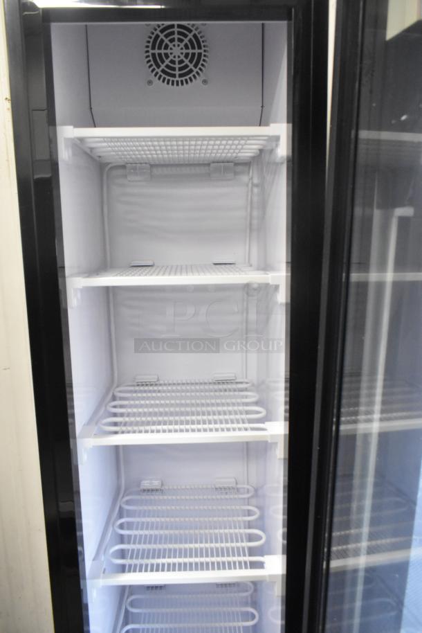 KoolMore KM-MDF-17S slim merchandiser freezer, 6.5 cu. ft., 17 in. width, manual defrost, metal shelves, 115 volts, excellent condition.