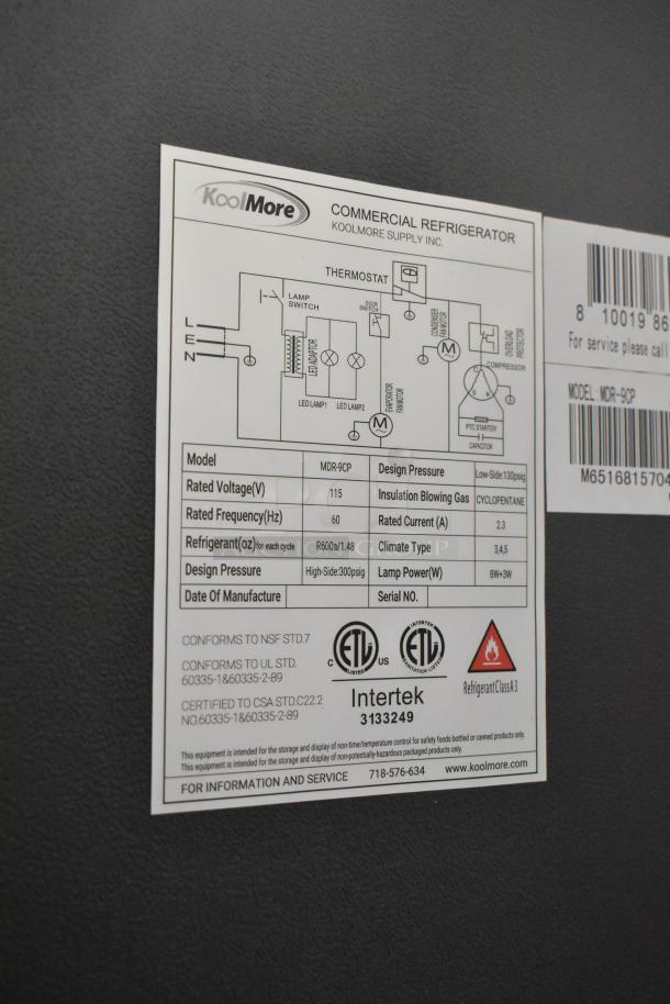 KoolMore MDR-9CP metal commercial cooler label, showing model specs and certifications. Features broken glass. 115 volts, 1 phase.