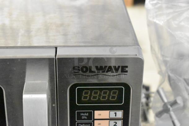Brand new Solwave 180MW1000SS stainless steel commercial microwave with push button controls; minor scratches.