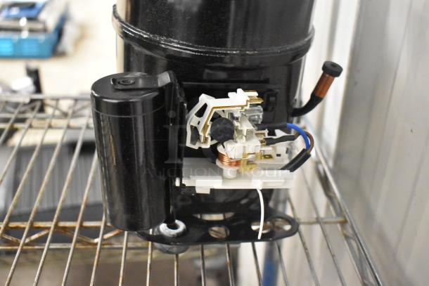 BRAND NEW Cubigel Avantco 178NPY14LR Compressor, R290, 115-127V, 1 Phase, with visible scratch and dent.