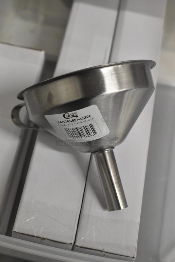Stainless steel funnel with label "#4074SSFNLSBX, 4'' x 4'', with handle" placed on white boxes.
