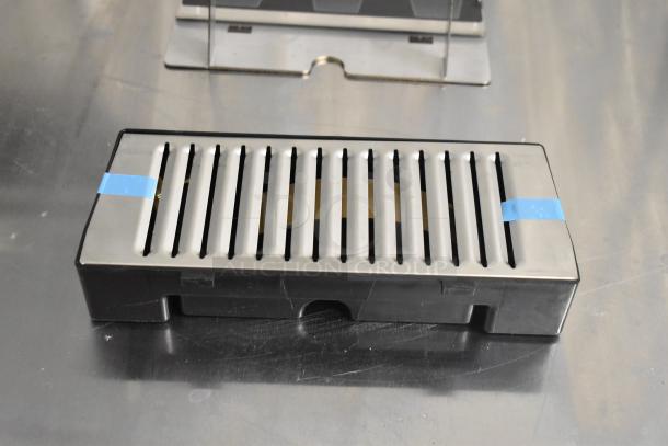 Drip tray with metal grate, part of a 6-item lot including Blue Poly Rapid Cool Bottles. Good condition.