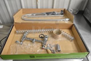 Brand new Regency 600PRD8X pre-rinse faucet, deck-mounted, 1.15 GPM, 8" centers, 44" hose, slight scratch and dent.