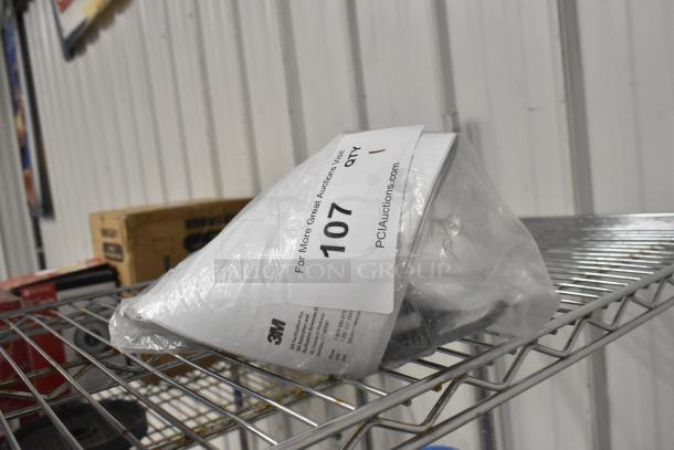 BRAND NEW SCRATCH AND DENT! 3M 6213001 filter head with shroud and gauge, 3/8" FNPT, labeled "107".