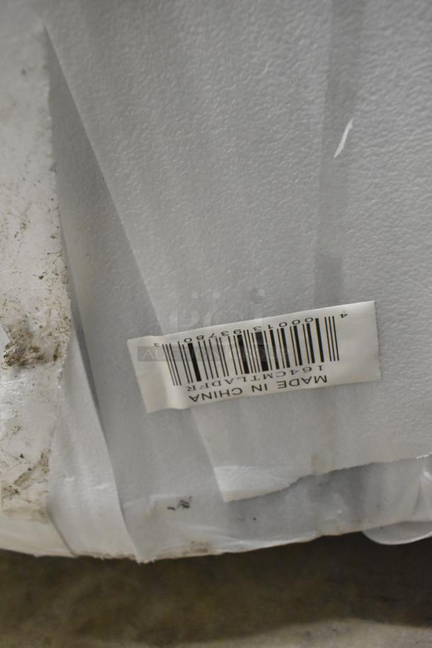 Barcode and text label reading "Made in China" on packaging of Lancaster Table & Seating 164CMTLADFR chairs.