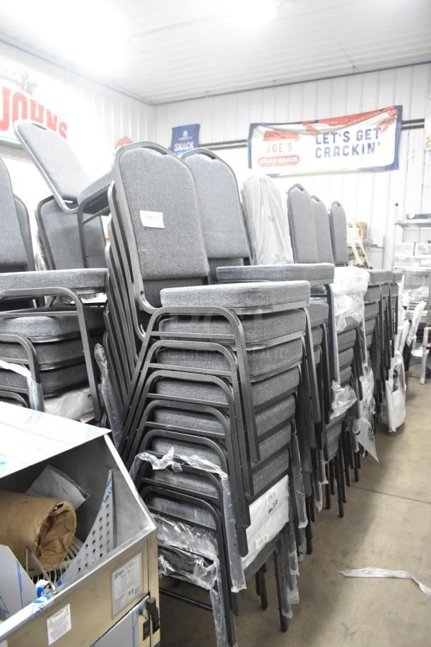 Stack of 120 brand new Lancaster Table & Seating banquet chairs, gray fabric, silver vein frame, crown back, labeled.
