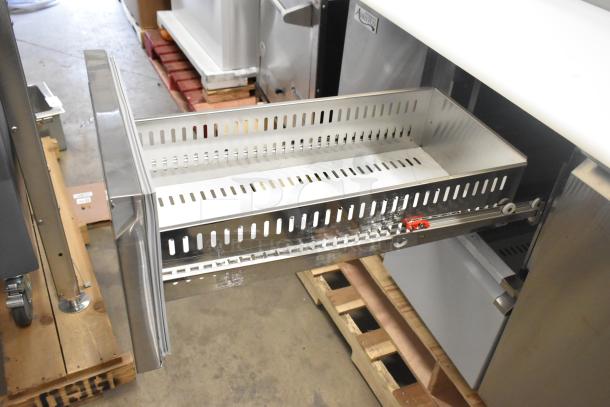 Avantco 178SSPPT260 stainless steel pizza prep table, new scratch and dent, features 2 drawers, 1 door, 115V, 1 phase.