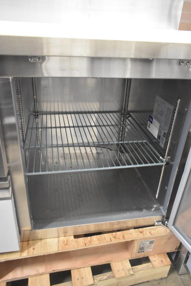 Brand new Avantco 178SSPPT260 stainless steel pizza prep table, scratch and dent, with 2 drawers and door. 115V, 1 phase.