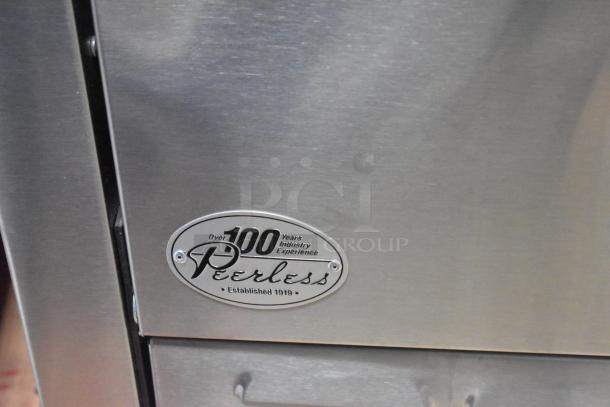 Peerless C131P stainless steel pizza oven, new with scratch and dent, door stuck closed, model tag shown.
