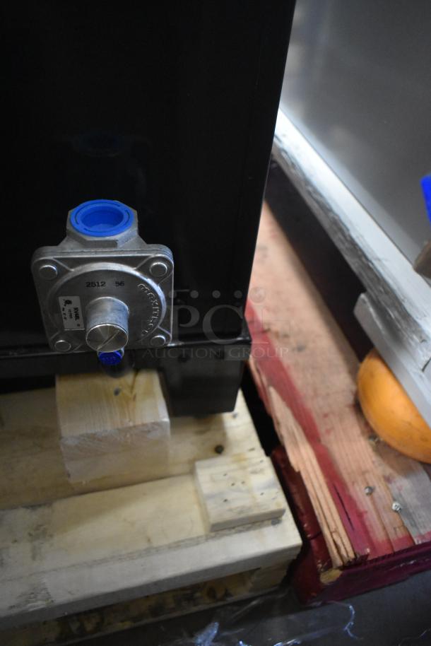 Brand new Peerless C131P pizza oven on pallet. Stainless steel, natural gas, 30,000 BTU. Door stuck closed.