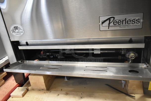 Peerless C131P stainless steel countertop pizza oven, 30,000 BTU, brand new with door stuck closed. Scratch and dent condition.