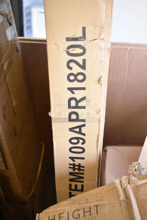 Cardboard box labeled "ITEM#109APR1820L" with visible dents, part of a 7-piece scratch and dent auction lot.