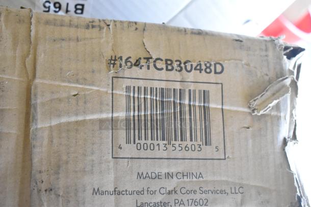Box with barcode labeled #164TCB3048D, Made in China for Clark Core Services, showing signs of wear.