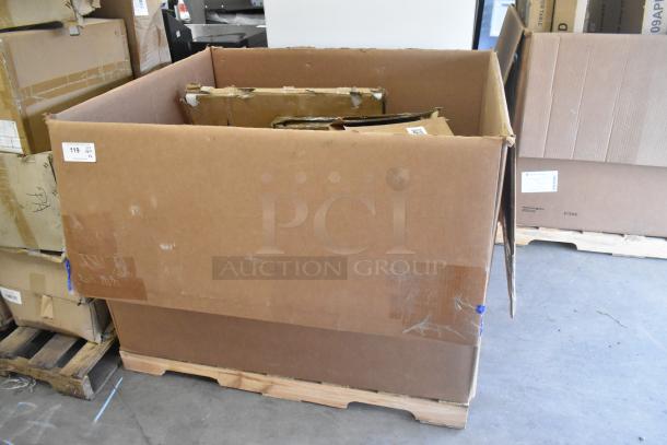 Large cardboard box on a pallet, containing six scratch and dent items, including a shelf and table. Box labeled "119."