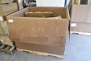 Large cardboard box on a pallet, containing six scratch and dent items, including a shelf and table. Box labeled "119."