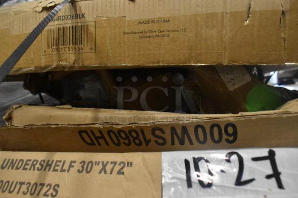 Sealed cardboard boxes labeled with "UNDERSHELF 30x72" and barcodes, containing new scratch and dent items, including shelves and sink.