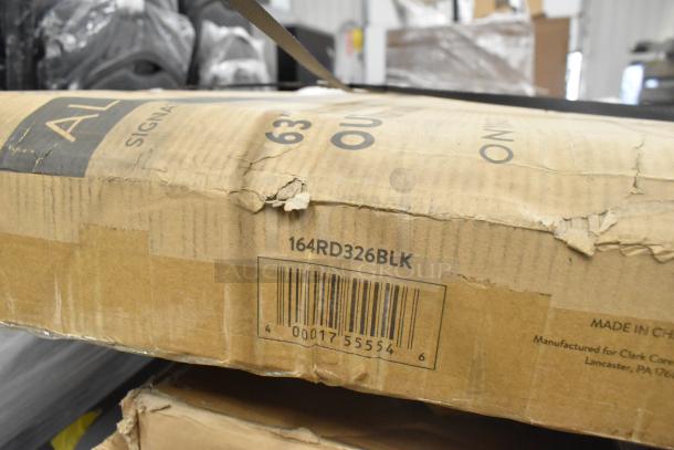 Cardboard box with visible wear and barcode, labeled "164RD326BLK"; contains scratch and dent items including a shelf and stainless sink.