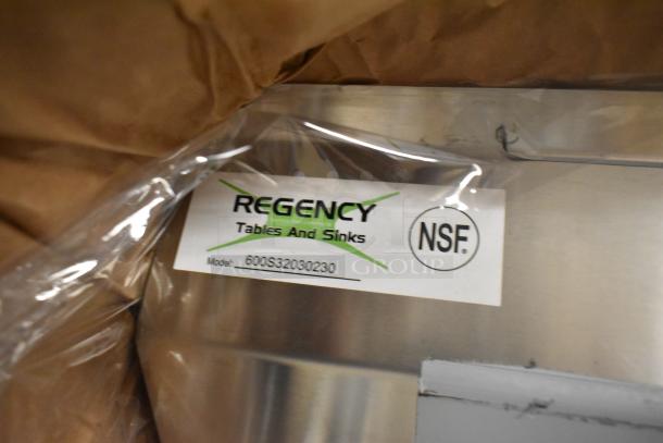 Regency stainless sink label showing "NSF" mark and model 600S32030230. Brand new, scratch and dent condition.