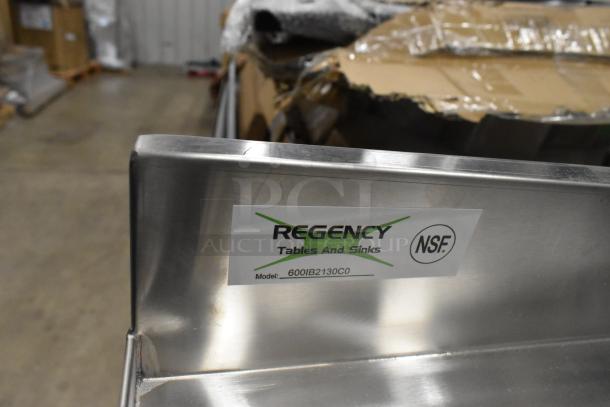 Regency stainless steel work table, model 600IB2130CO, with NSF certification label, brand new condition.