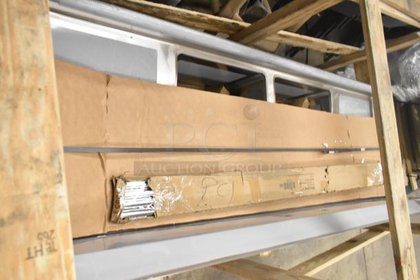 Regency 600S21620218 stainless steel 2 bay sink with dual drain boards, brand new in crate.