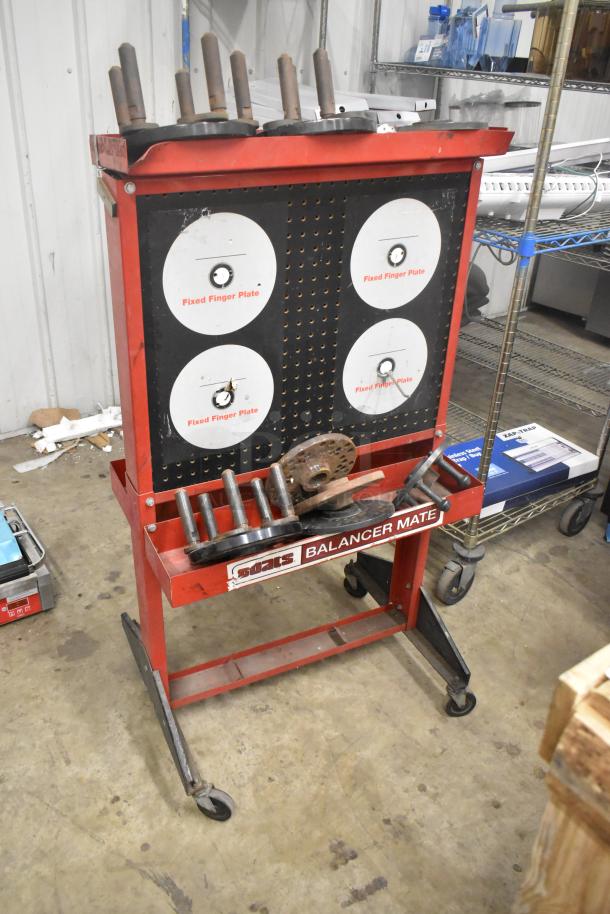 Coats Red Metal Floor Style Balancer Mate on casters, with fixed finger plates, in good condition. Labels indicate brand.