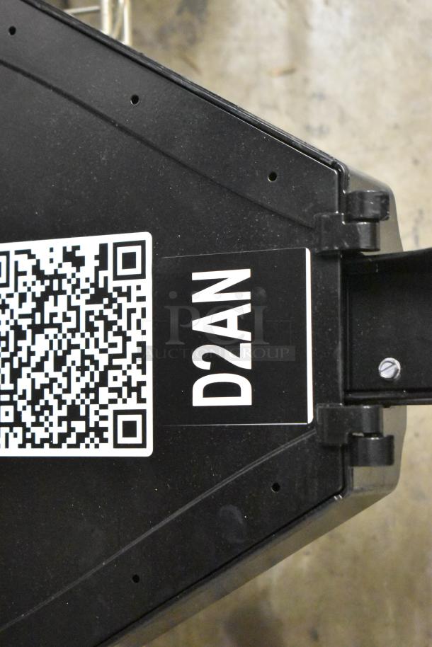 Brand new light fixture with minor scratches and dents. Includes QR code and label marked "D2AN." Two fixtures available.