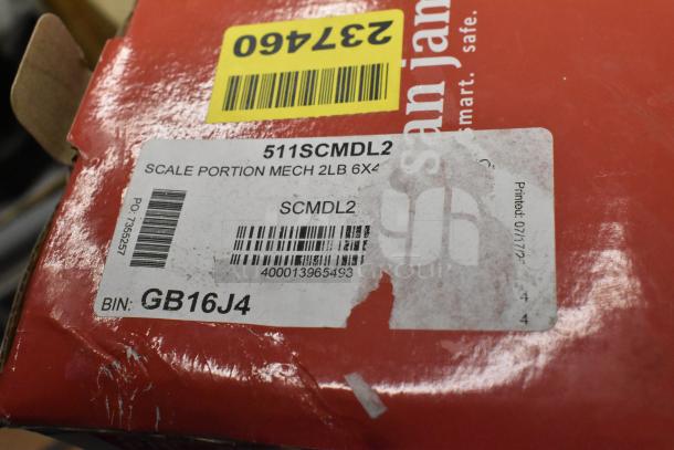 Brand new San Jamar / Escali SCMDL2, 2 lb. mechanical dial kitchen scale, scratch and dent condition, box labeled.