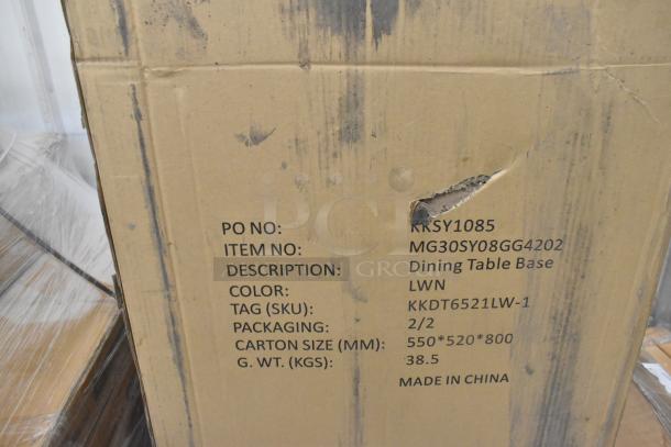 Cardboard box labeled "MG30SY08GG4202 Dining Table Base," with visible scratches and dent. Packaging info and item details noted.