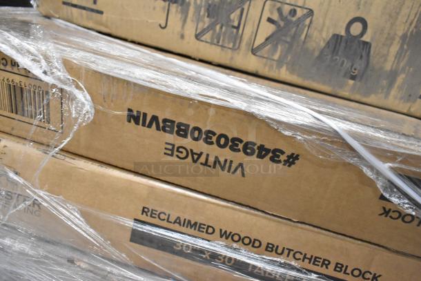 Boxes containing Lancaster Table & Seating 30" x 30" square wood butcher block table tops, wrapped in plastic, vintage finish.