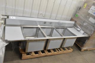BRAND NEW SCRATCH AND DENT! Regency 600S31824218 Stainless Steel 3 Bay Sink w/ Dual Drain Boards. No Legs. - Item #1223219
