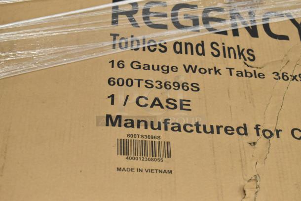 Cardboard box labeled "Regency 600TS3696S, 36x96" 16 Gauge Stainless Steel Work Table," barcoded, made in Vietnam.