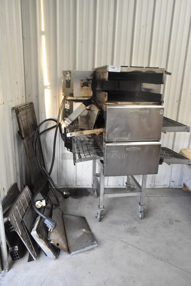3 Turbochef HhC2020 stainless steel rapid cook conveyor ovens on casters, 208/240V, 3-phase, used condition.