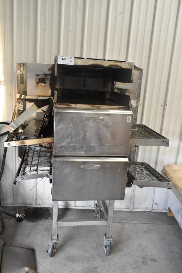 Three 2016 Turbochef HhC2020 stainless steel rapid cook conveyor ovens on casters. Electric, 208/240V, 3 Phase.