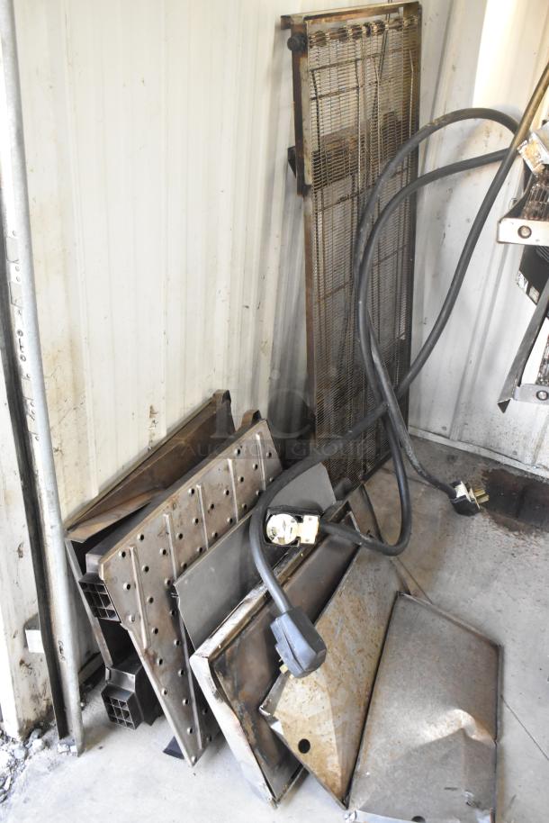 Components of Turbochef HhC2020 ovens, including metal panels and power cables, in used condition.