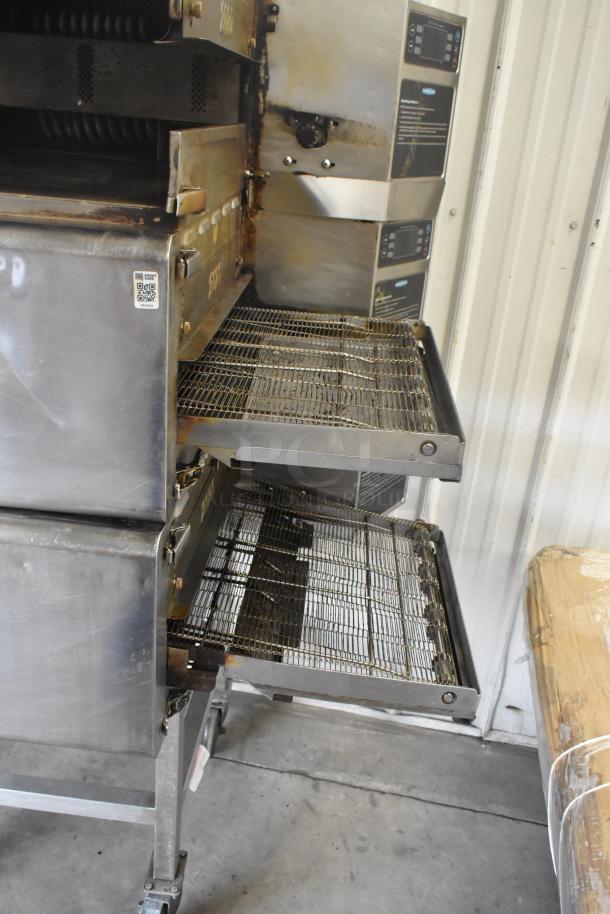 Turbochef HhC2020 stainless steel rapid cook conveyor oven, commercial casters, 208/240V, 3 phase, used condition.
