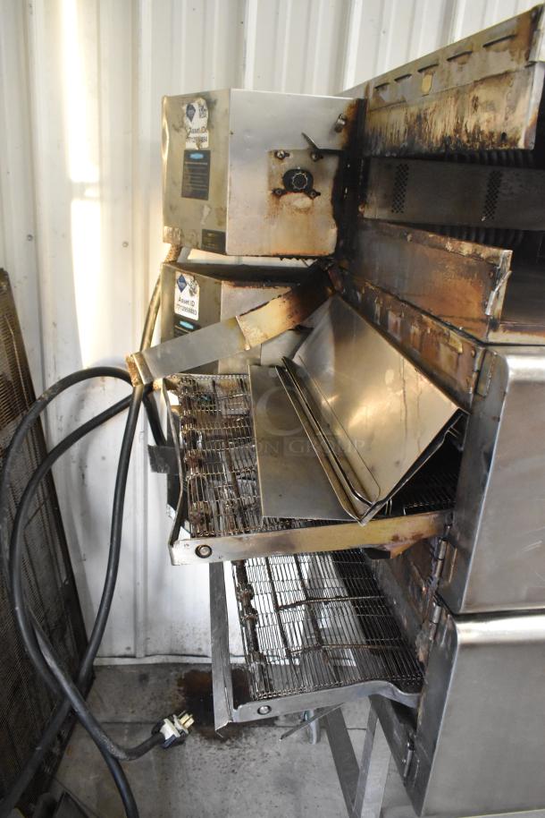 Turbochef HhC2020 stainless steel conveyor oven, used, electric-powered, on casters, 208/240V, 3-phase, visible wear.