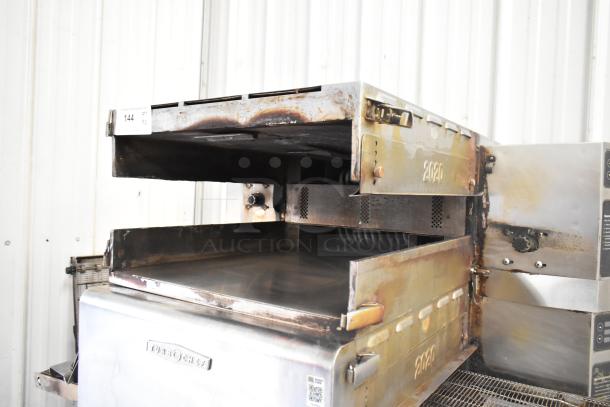 Turbochef HhC2020 stainless steel rapid cook conveyor oven on commercial casters, showing signs of use. 208/240V, 3 phase.