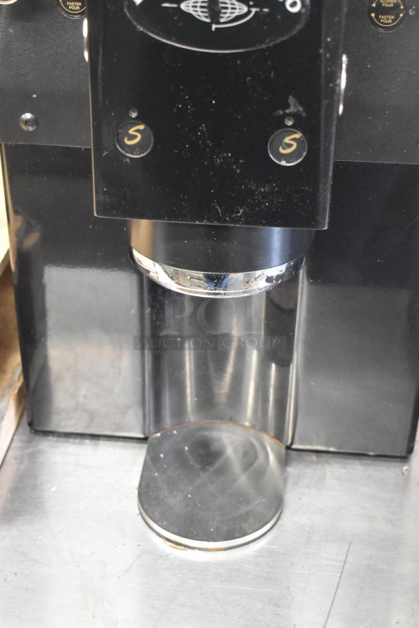 La Marzocco Swift E.P.S.B. espresso grinder, dual hoppers, metal finish, commercial use, 120V, 1 phase. Good condition.