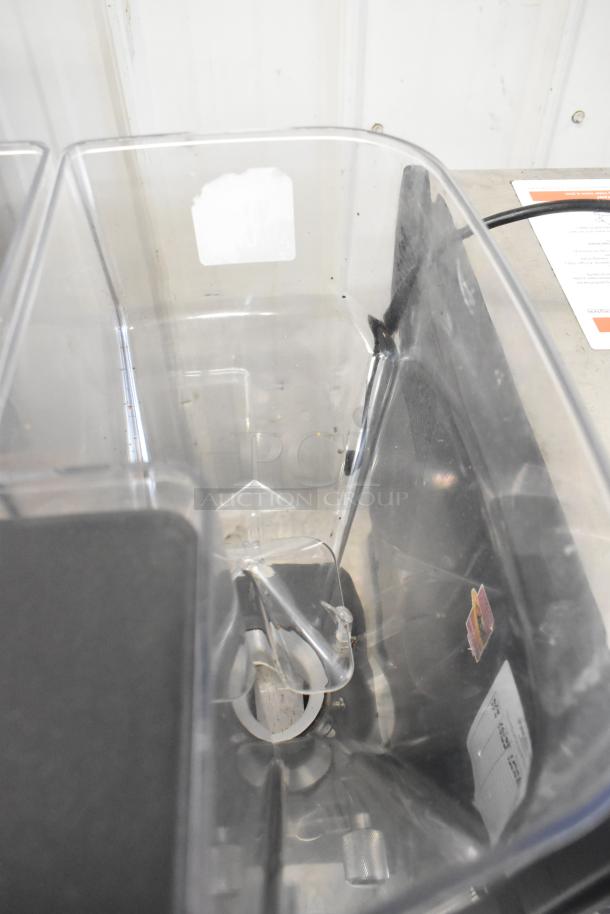 La Marzocco Swift E.P.S.B. metal commercial espresso grinder with two hoppers, 120V, 1 phase, visible internal components.