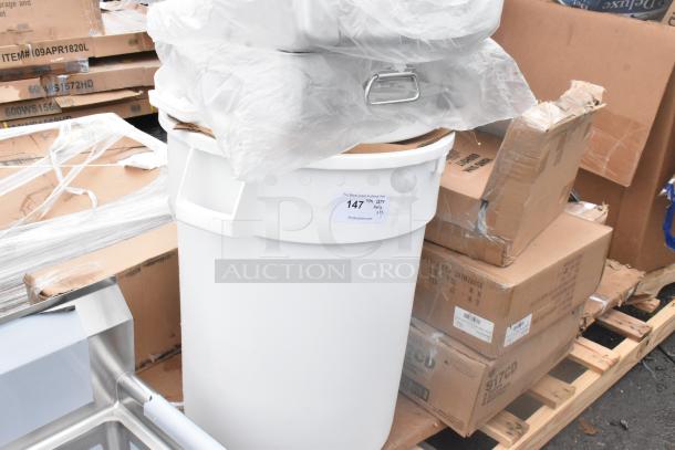 12 brand new items including a hand sink and pot rack, packaged on a pallet; some labeled "For More Great Auctions Visit."